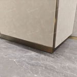 Asymmetrical Beige Sideboard with Embossed Textured Panels, Angled Drawer Fronts and Satin Bronze Frame